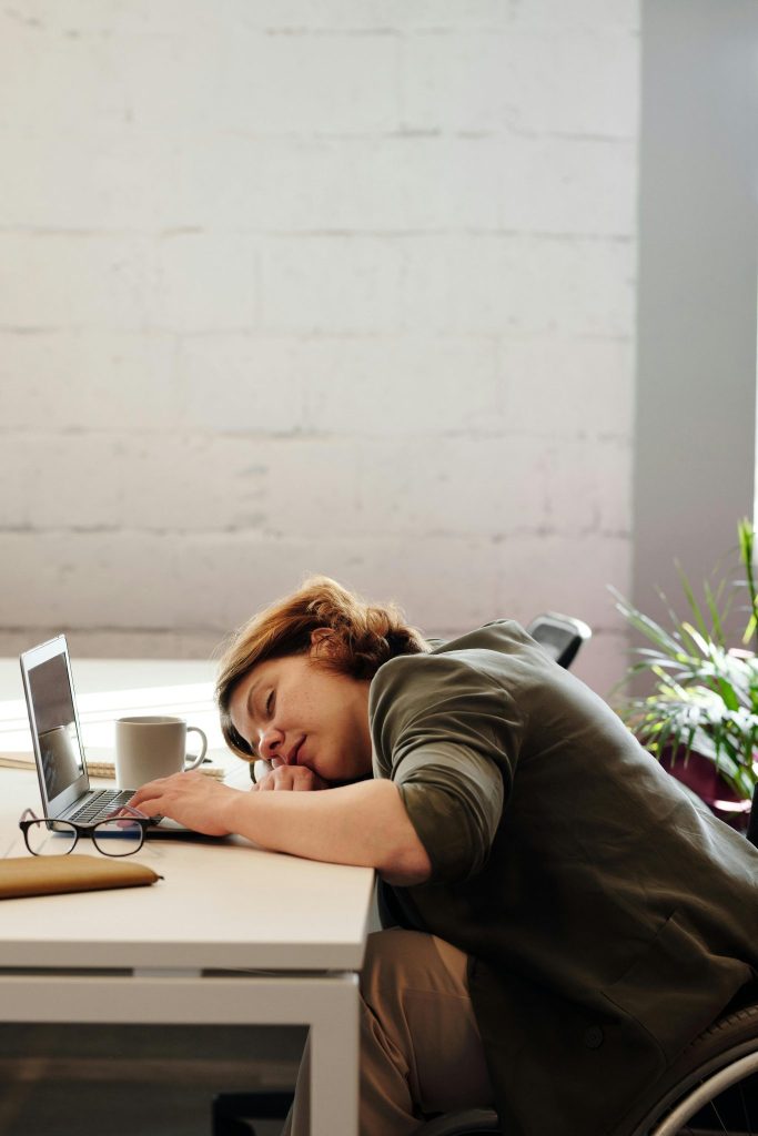 Female, asleep on desk